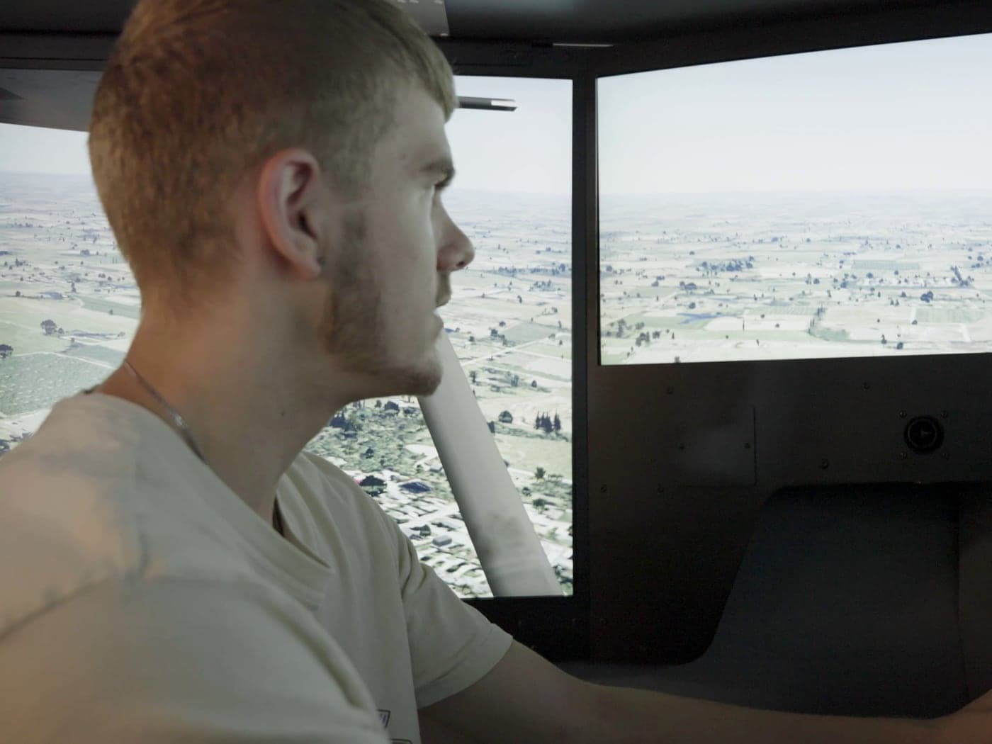 Highland Prep West student flying the RedBird FMX flight simulator